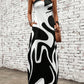 LUNE Graphic Print Criss Cross Halter Neck Hidden Pocket Maxi Dress